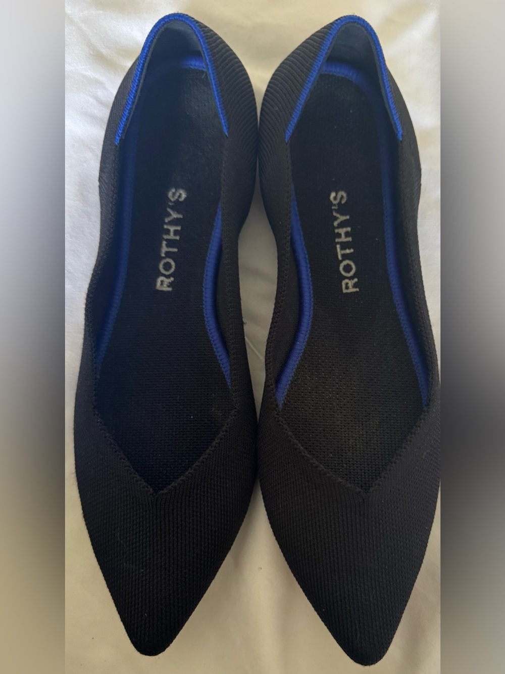 Rothy's Pointed Toe Flats in Black with Blue Trim